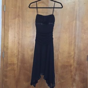 City Triangle; black dress.